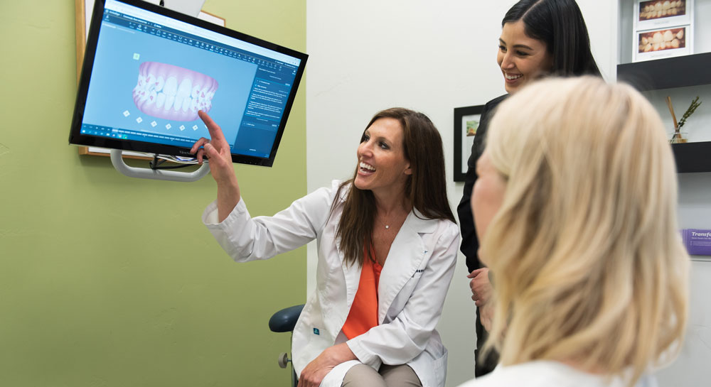 dr kassmel looking at invisalign scan