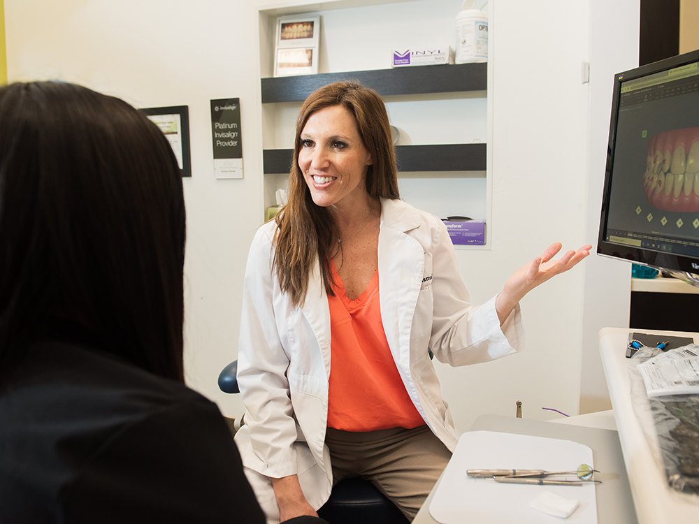 dr kassmel looking at invisalign scan