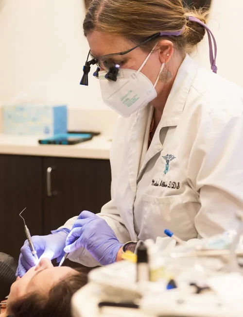 dr albers working on patients teeth